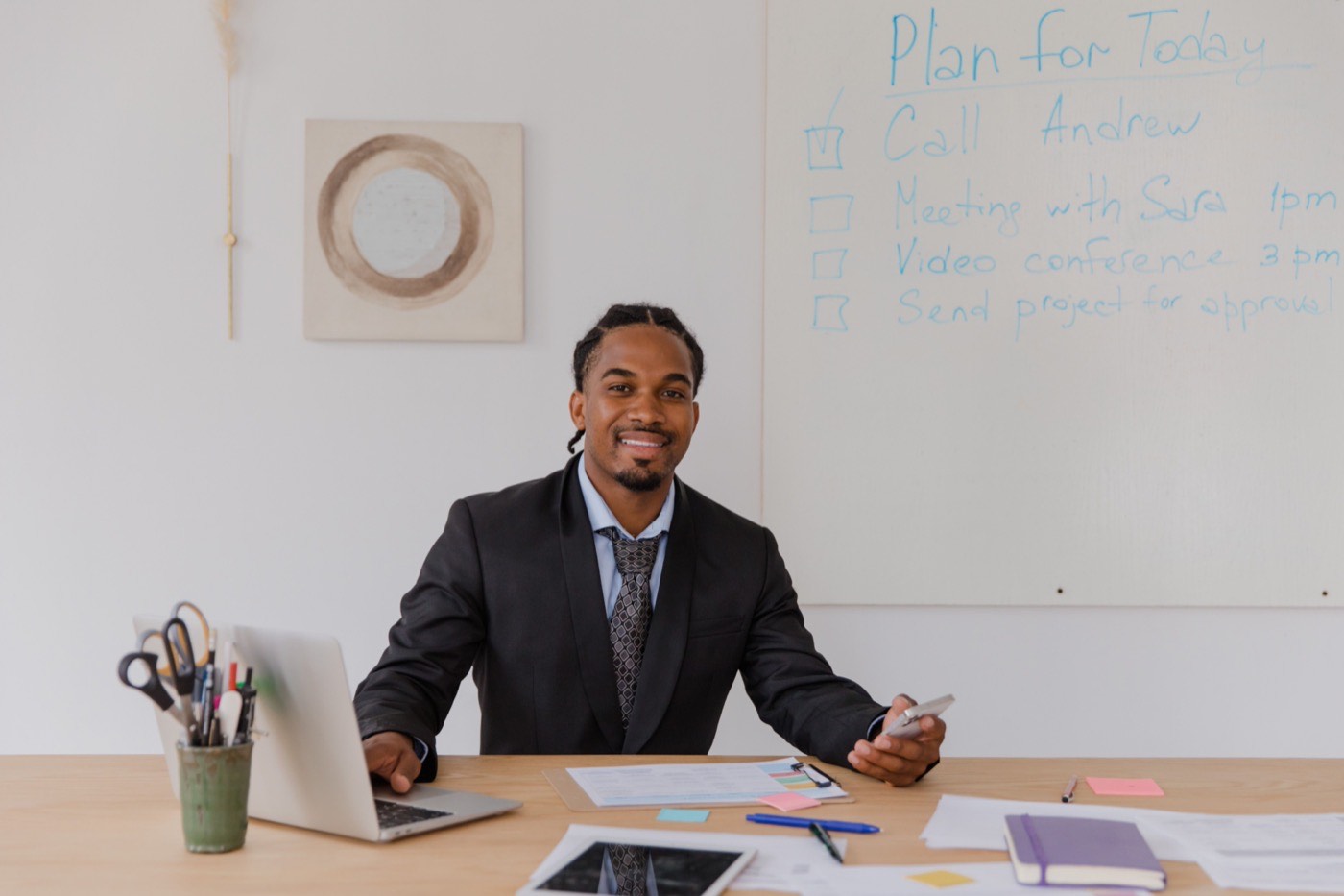 A team lead at his desk planning the day's work